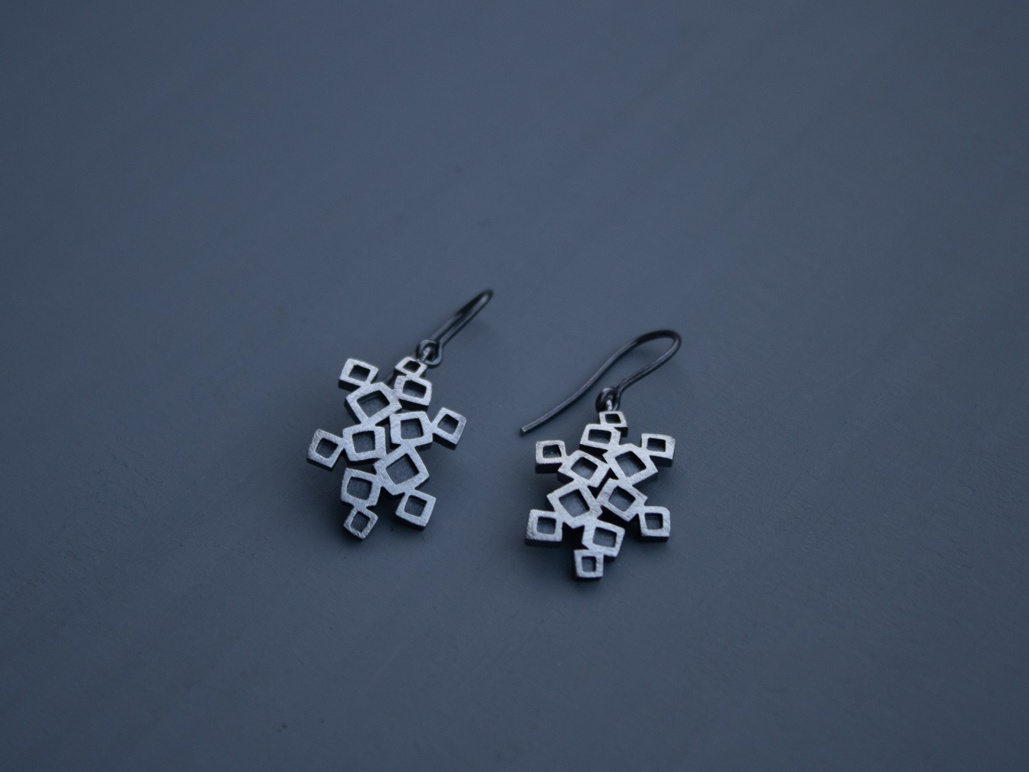 Arracades grans Quadradets oxidades.